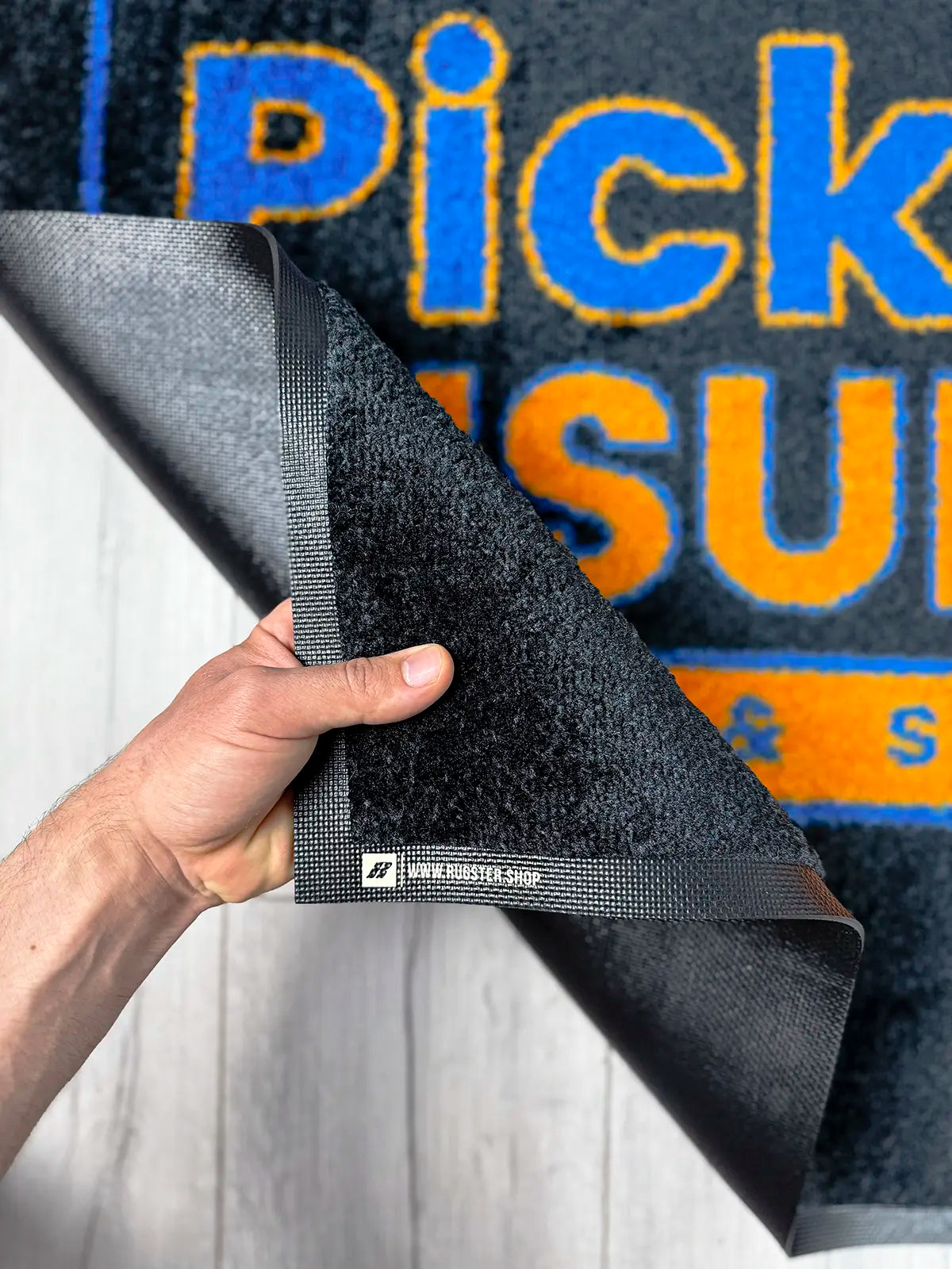 Premium indoor logo mat close-up showing print quality