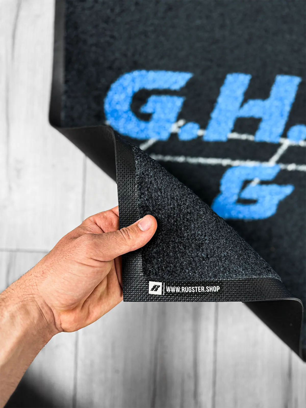 Close-up of printed branding on indoor logo entrance mat