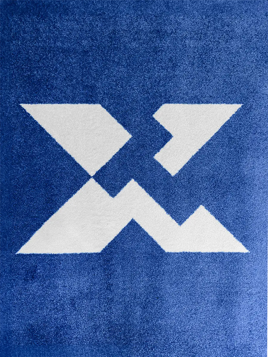 blue background indoor logo mat closeup shot showcasing the texture